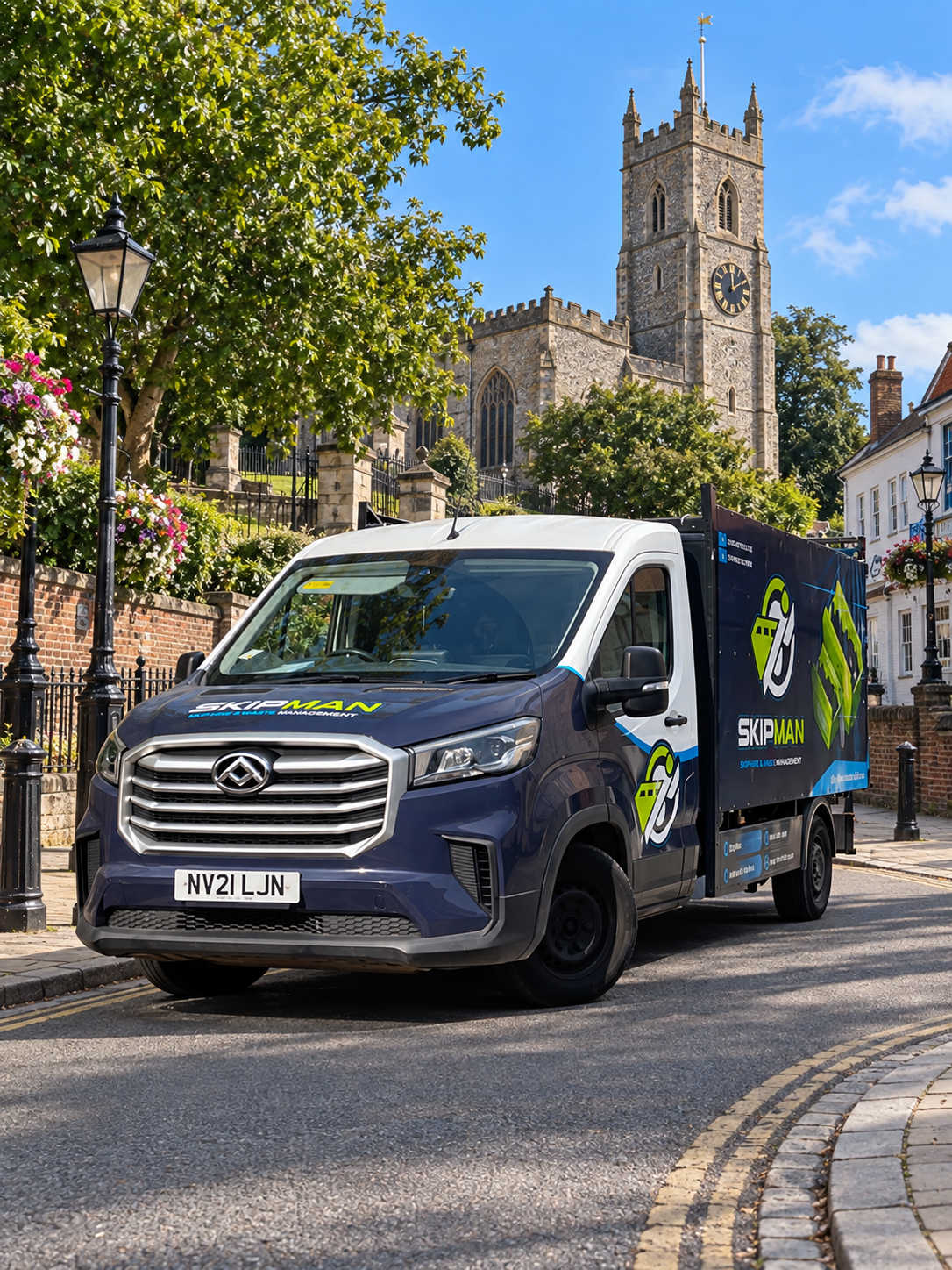 SKIPMAN branded cage van outside St Mary's Church in Harrow on the Hill